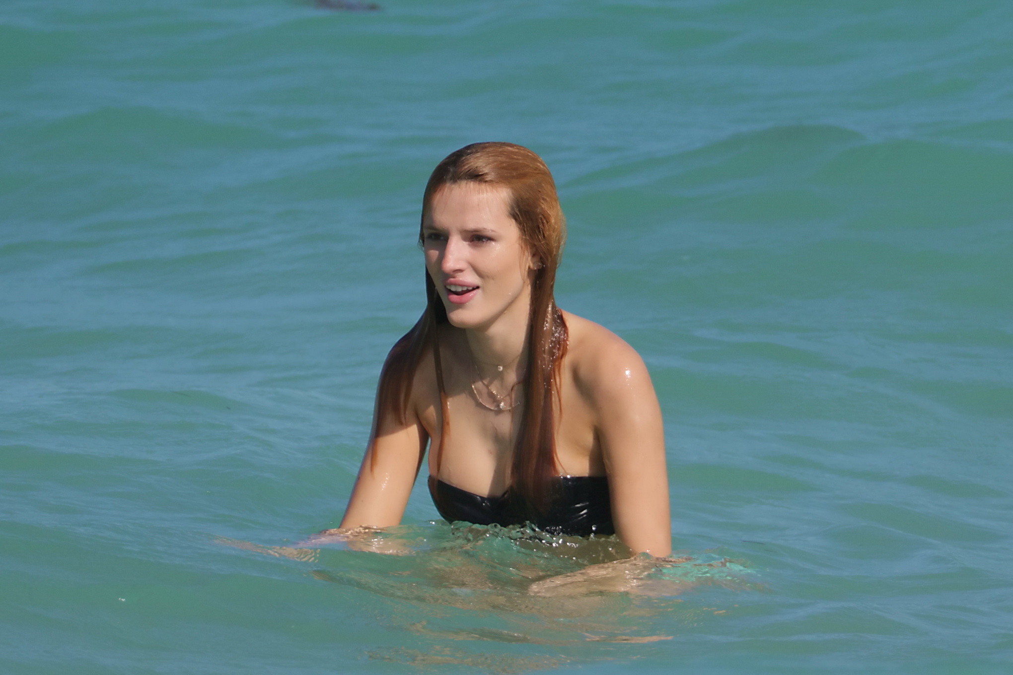 Bella Thorne nipslip and showing her juicy ass in a strapless bikini at the beac #75180618