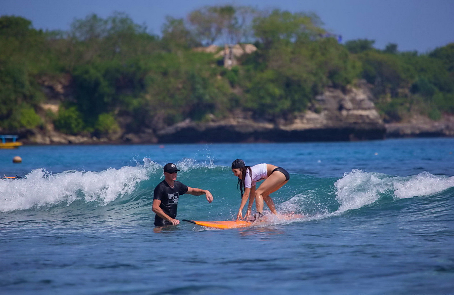 Vanessa Hudgens wearing black bikini while surfing at the Oakley Learn To Surf E #75228601