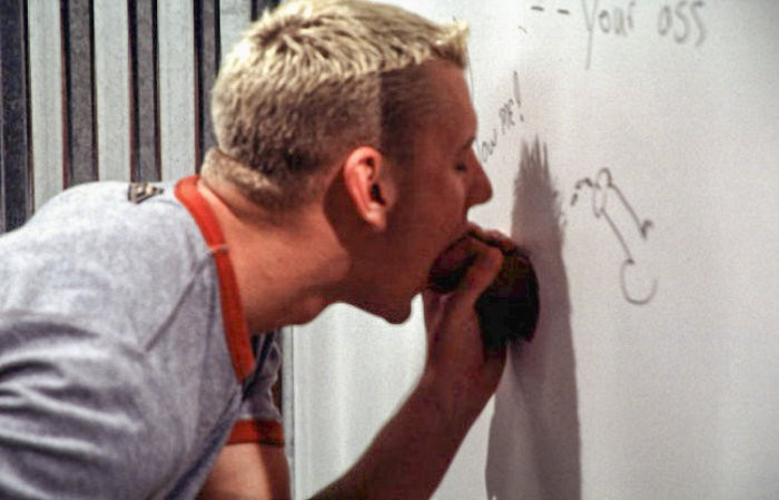 Two studs having glory hole affairs  in local john #76913973