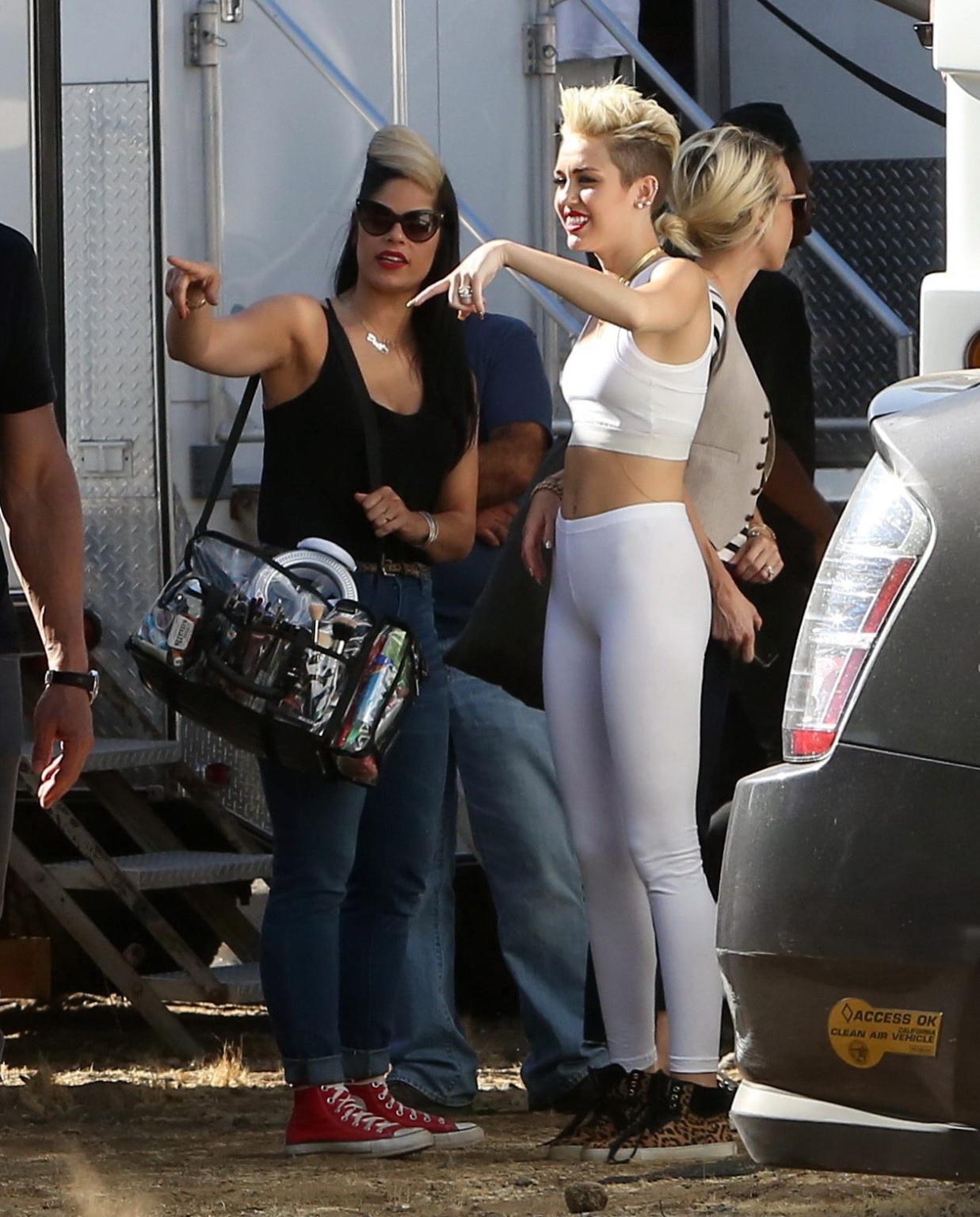 Miley Cyrus wearing the white tights  a sports bra on a music video set in LA #75230760