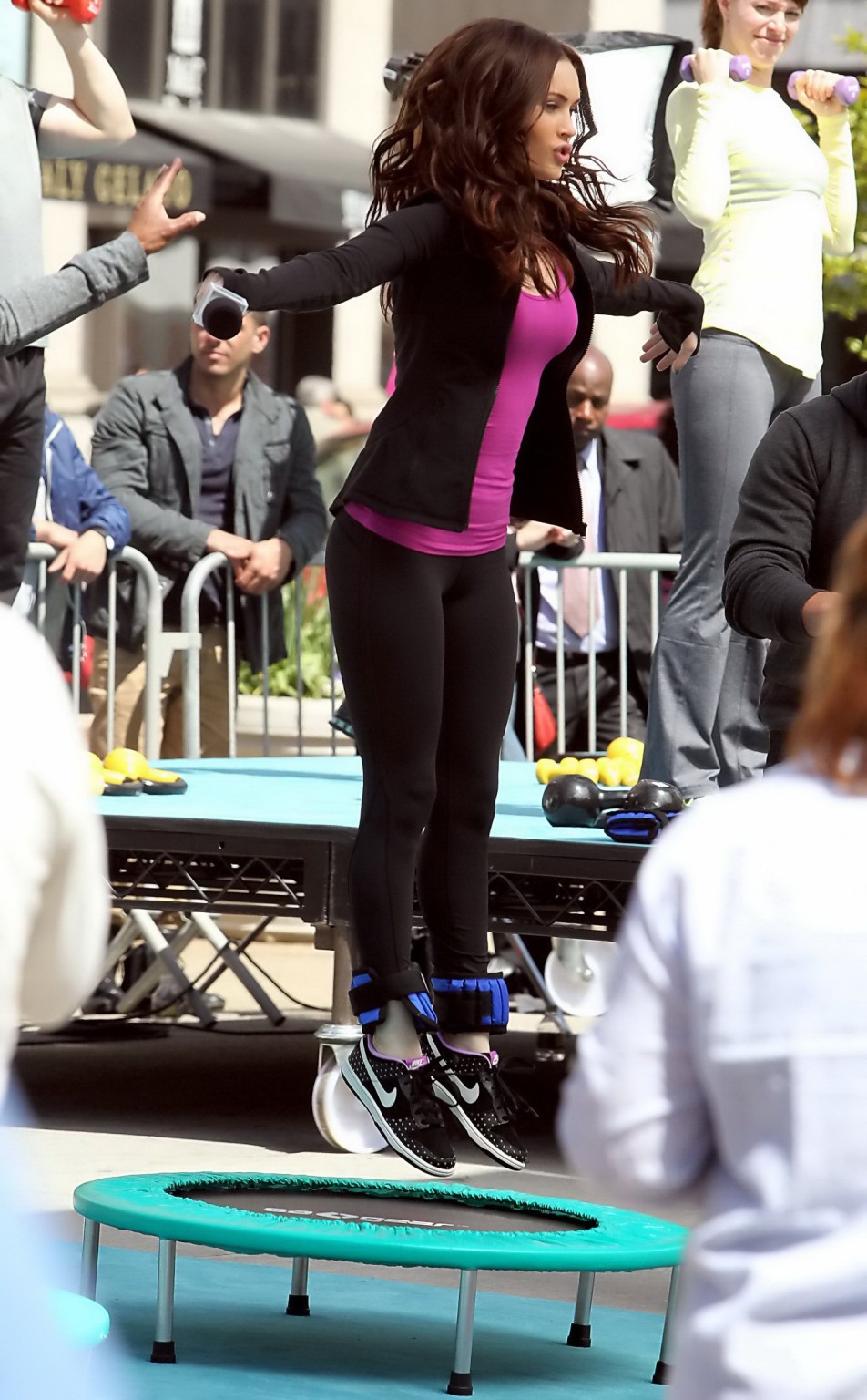 Megan Fox cleavy wearing tight outfit while jumps on trampoline at the TMNT set #75233011