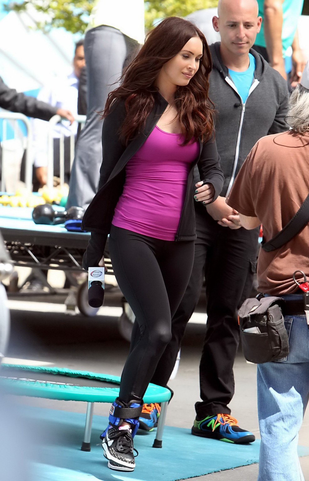 Megan Fox cleavy wearing tight outfit while jumps on trampoline at the TMNT set #75233059