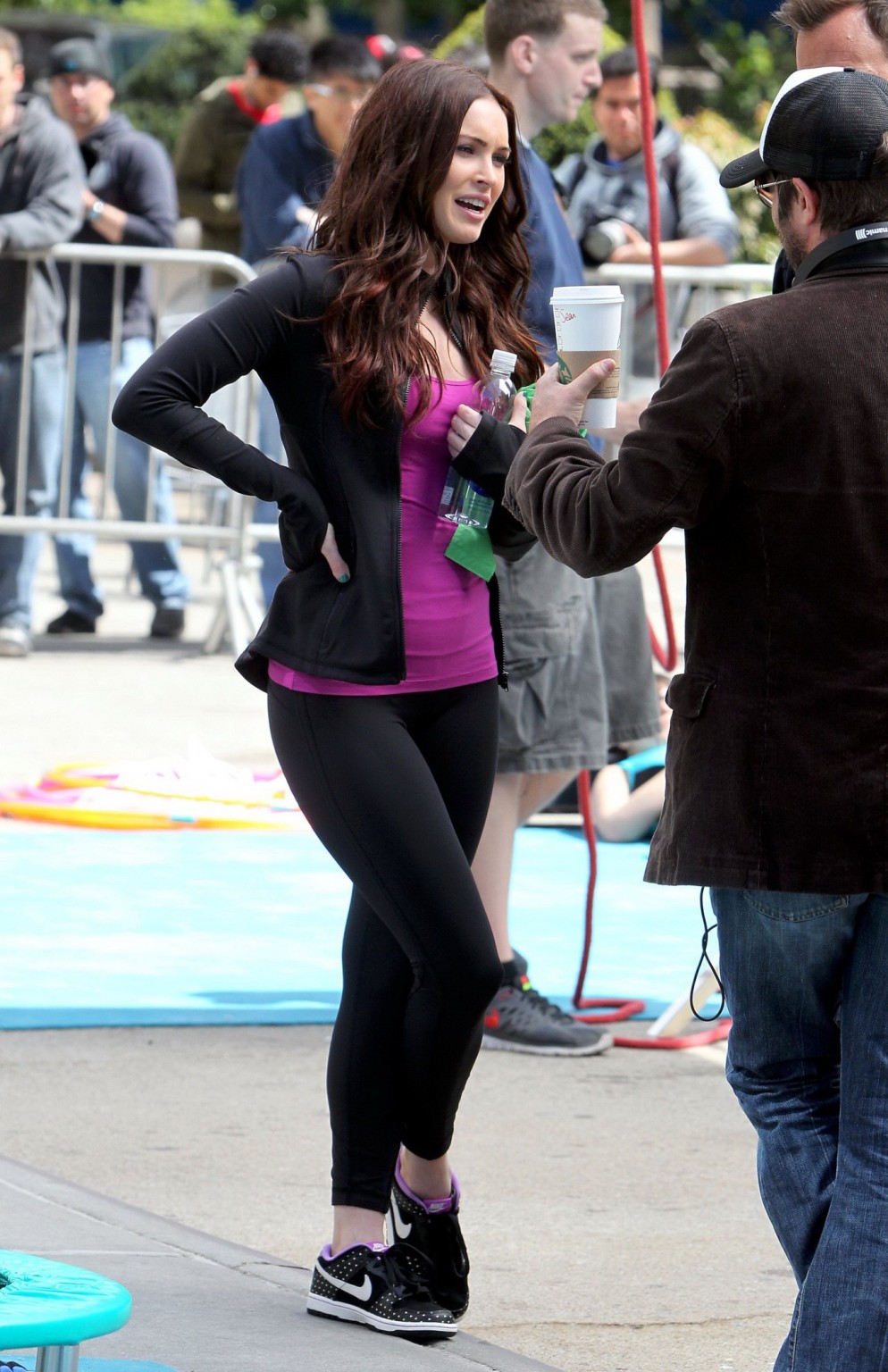 Megan Fox cleavy wearing tight outfit while jumps on trampoline at the TMNT set #75233071