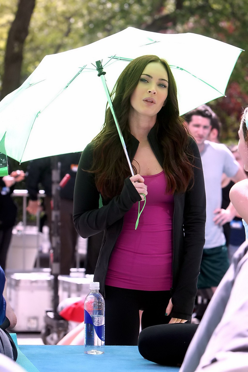 Megan Fox cleavy wearing tight outfit while jumps on trampoline at the TMNT set #75233114