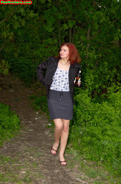 Redhead slut peeing near river after beer drinking #78616693
