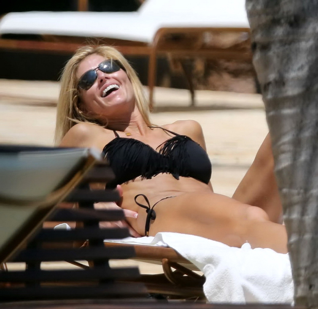 Torrie Wilson showing off her bikini body on a beach in Miami #75235116