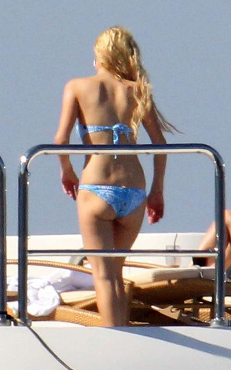 Paris Hilton exposing her nice tits while sunbathing topless on yacht paparazzi  #75340704