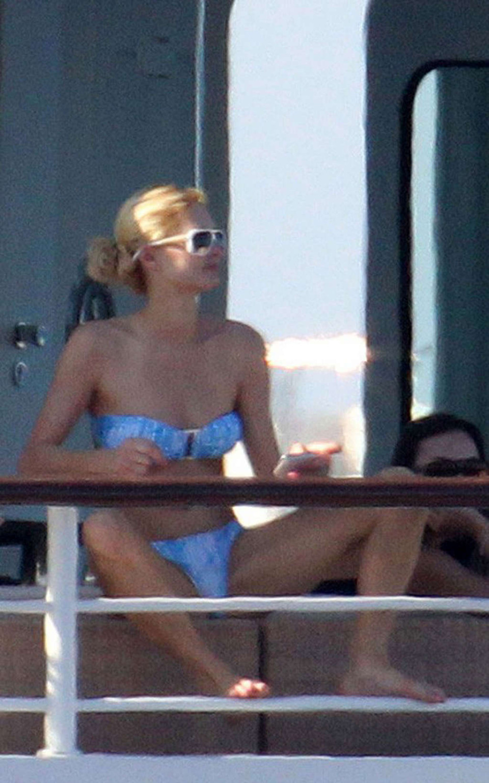 Paris Hilton exposing her nice tits while sunbathing topless on yacht paparazzi  #75340716