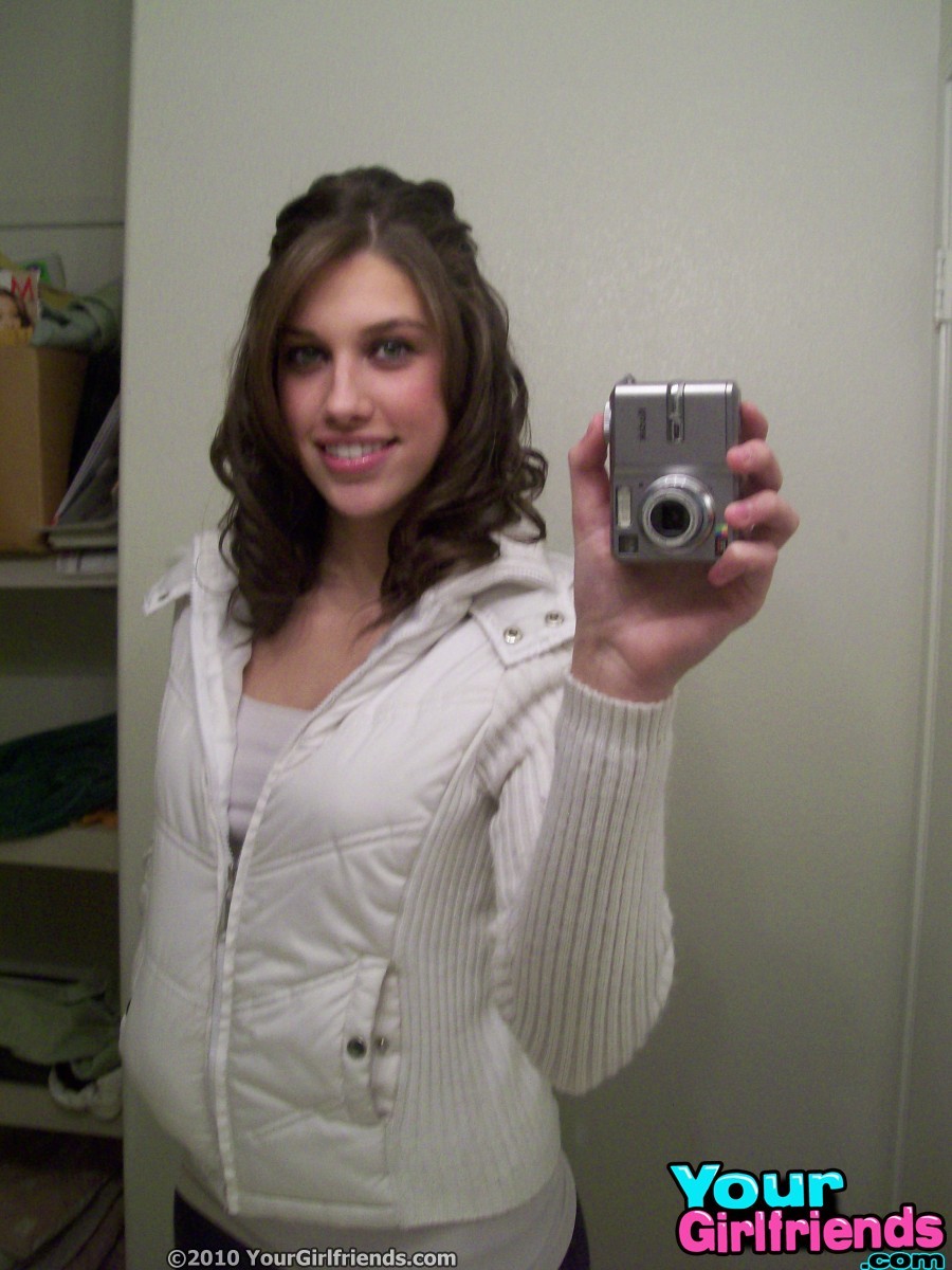 Teen Girlfriend whip out the camera in the bathroom mirror for some hot self mir