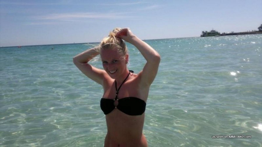 Photos of a sexy blonde babe posing in her black bikini #67233066