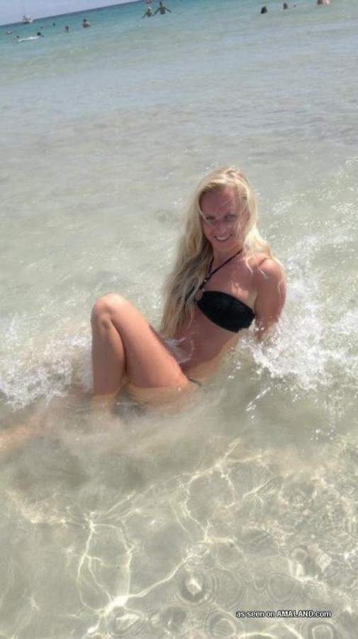 Photos of a sexy blonde babe posing in her black bikini #67233072