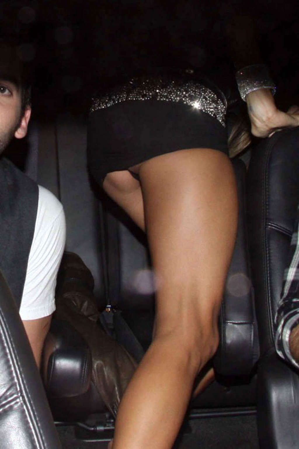 Alessandra Ambrosio posing with roller blades and upskirt in car #75363376