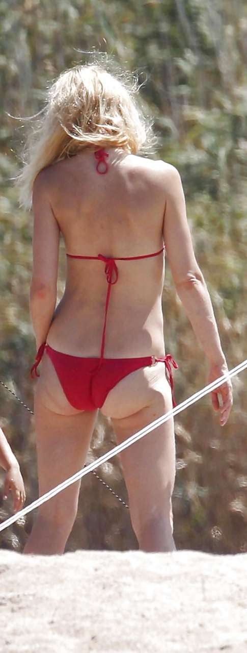 Gwyneth Paltrow showing her panties upskirt and great ass in red bikini on beach #75288798