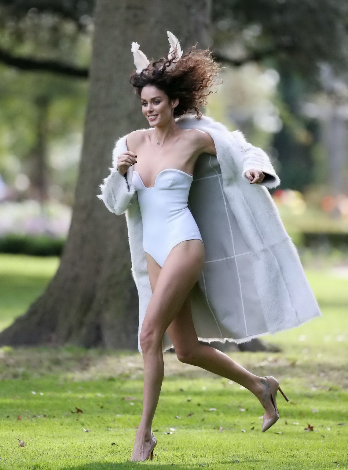 Nicole Trunfio slips out of her white tube bodysuit while shooting at the garden #75224236