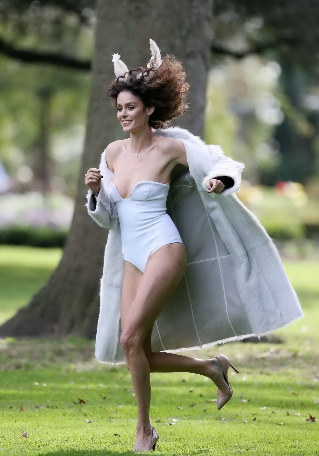 Nicole Trunfio slips out of her white tube bodysuit while shooting at the garden #75224244