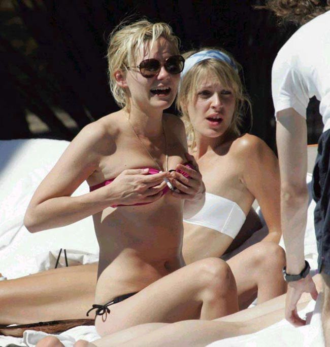 Celebrity Kirsten Dunst nice nipple slip on the beach #75400541