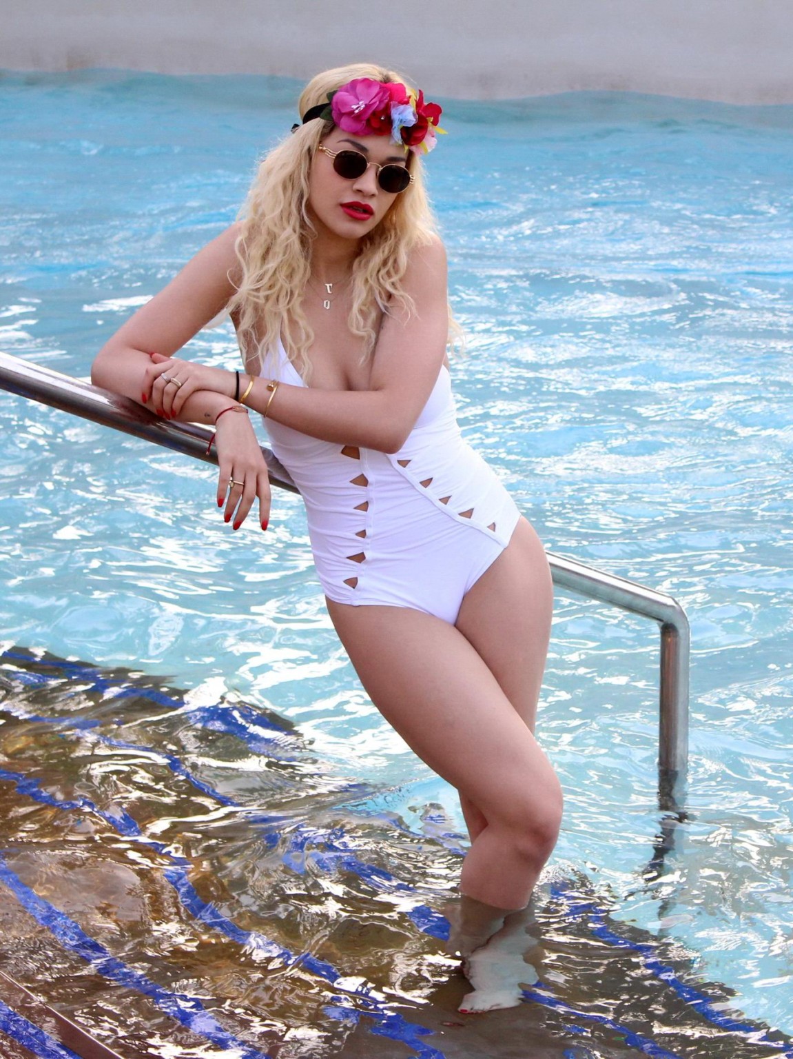 Rita Ora busty wearing a white slightly see through swimsuit at the pool in Duba #75244983