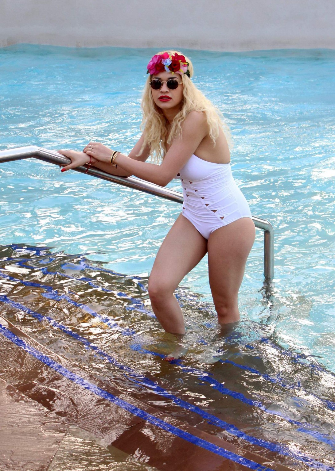 Rita Ora busty wearing a white slightly see through swimsuit at the pool in Duba #75245008