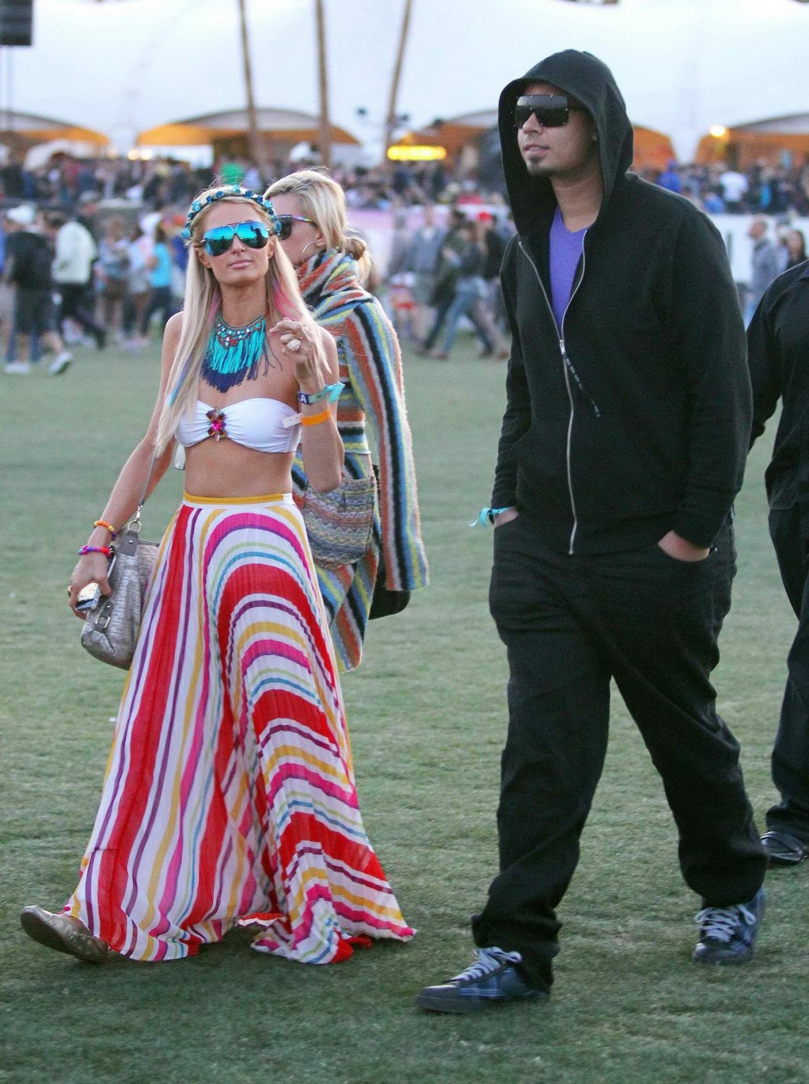 Paris Hilton wearing bikini top  skirt at Coachella Music Festival #75265933