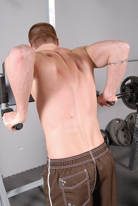 Red and dark haired muscles sucking in a gym after workout #76963108