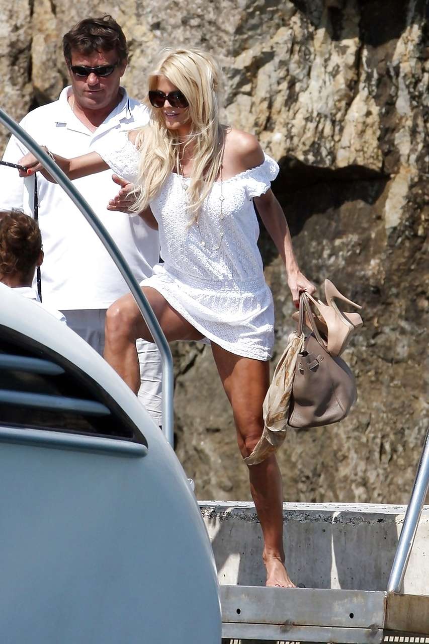 Victoria Silvstedt upskirt while enter on boat and sexy in bikini #75261511