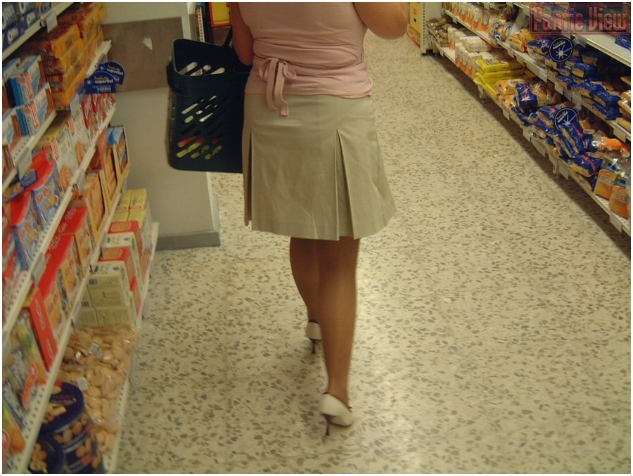 Upskirt girl in shop showing here black panties under pantyhose #76487129