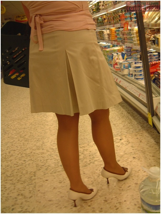 Upskirt girl in shop showing here black panties under pantyhose #76487143