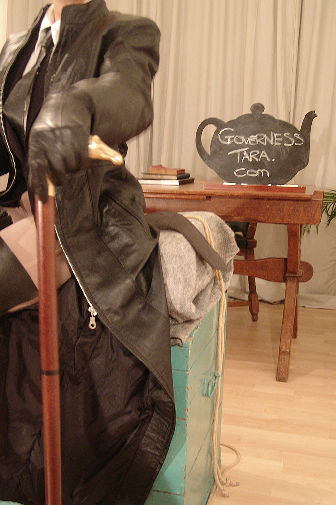 Strict domina in jodphurs and leather coat and riding boots #72185385