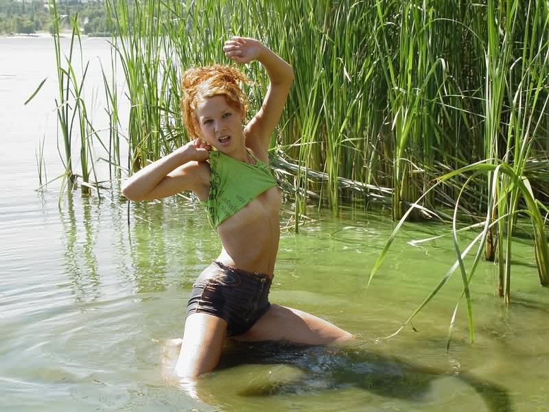 Slim and sassy redhead bares all her tan lines at the lake #78606441