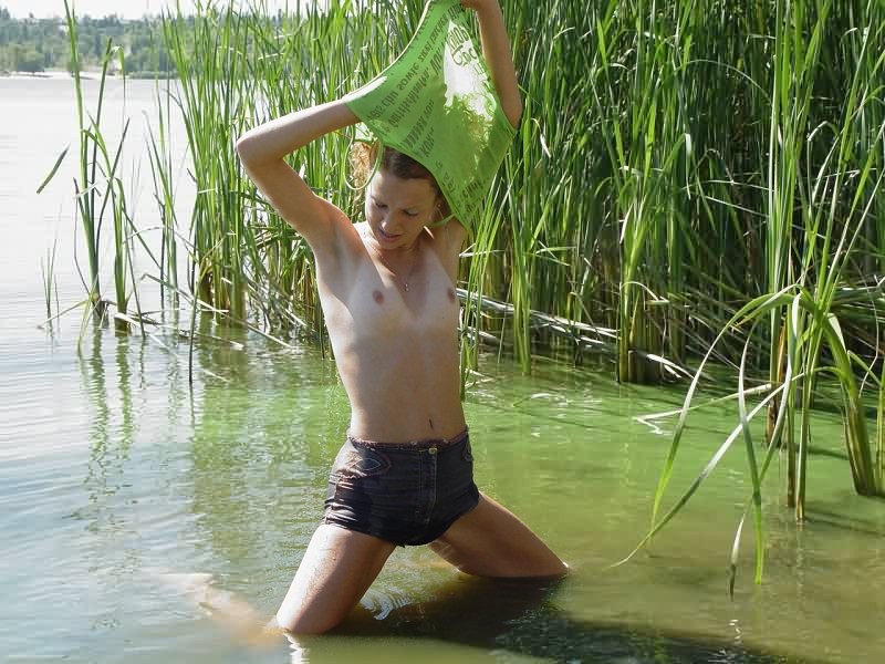 Slim and sassy redhead bares all her tan lines at the lake #78606449