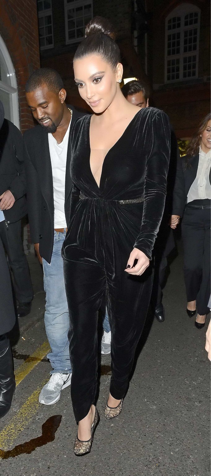 Kim Kardashian shows cleavage  pokies wearing a sexy black outfit outside a rest #75248858