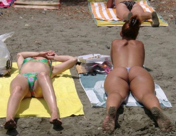 Two nudist friends get an even tan at the beach #72248929