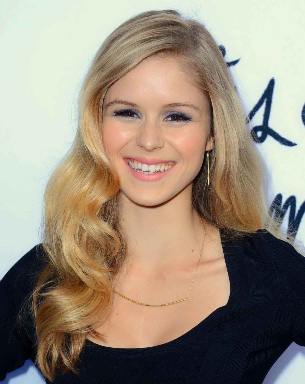 Erin Moriarty shows big cleavage wearing sexy black mini dress at The Kings of S #75230268