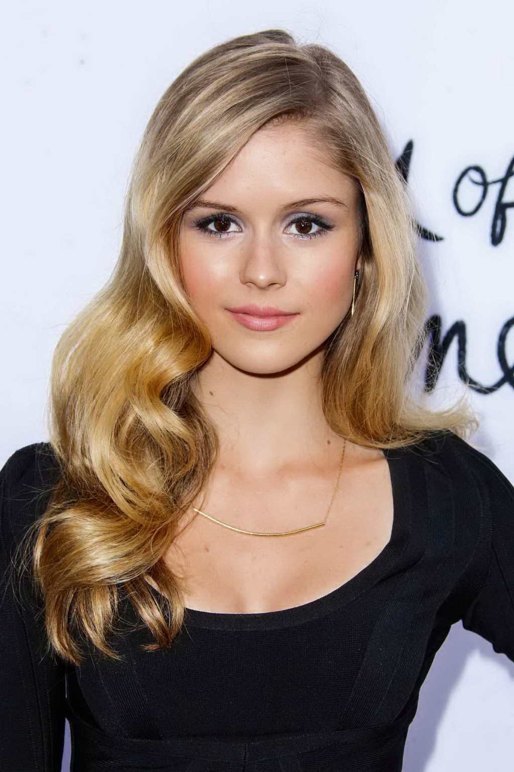 Erin Moriarty shows big cleavage wearing sexy black mini dress at The Kings of S #75230323
