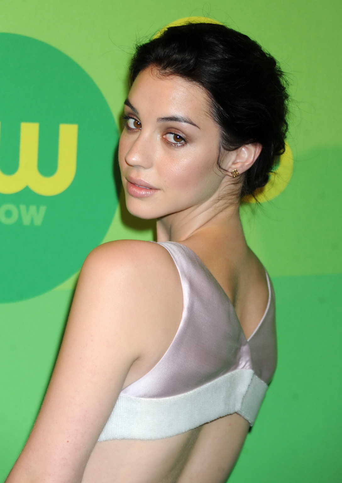 Adelaide Kane busty wearing short flesh colored backless dress at The CW Network #75223042
