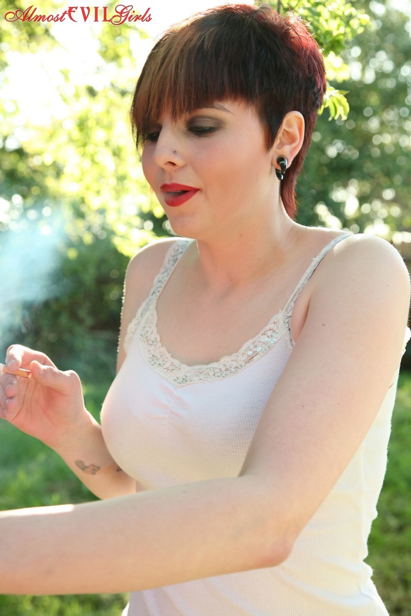 Morna smokes it up outside while she strips #76403773