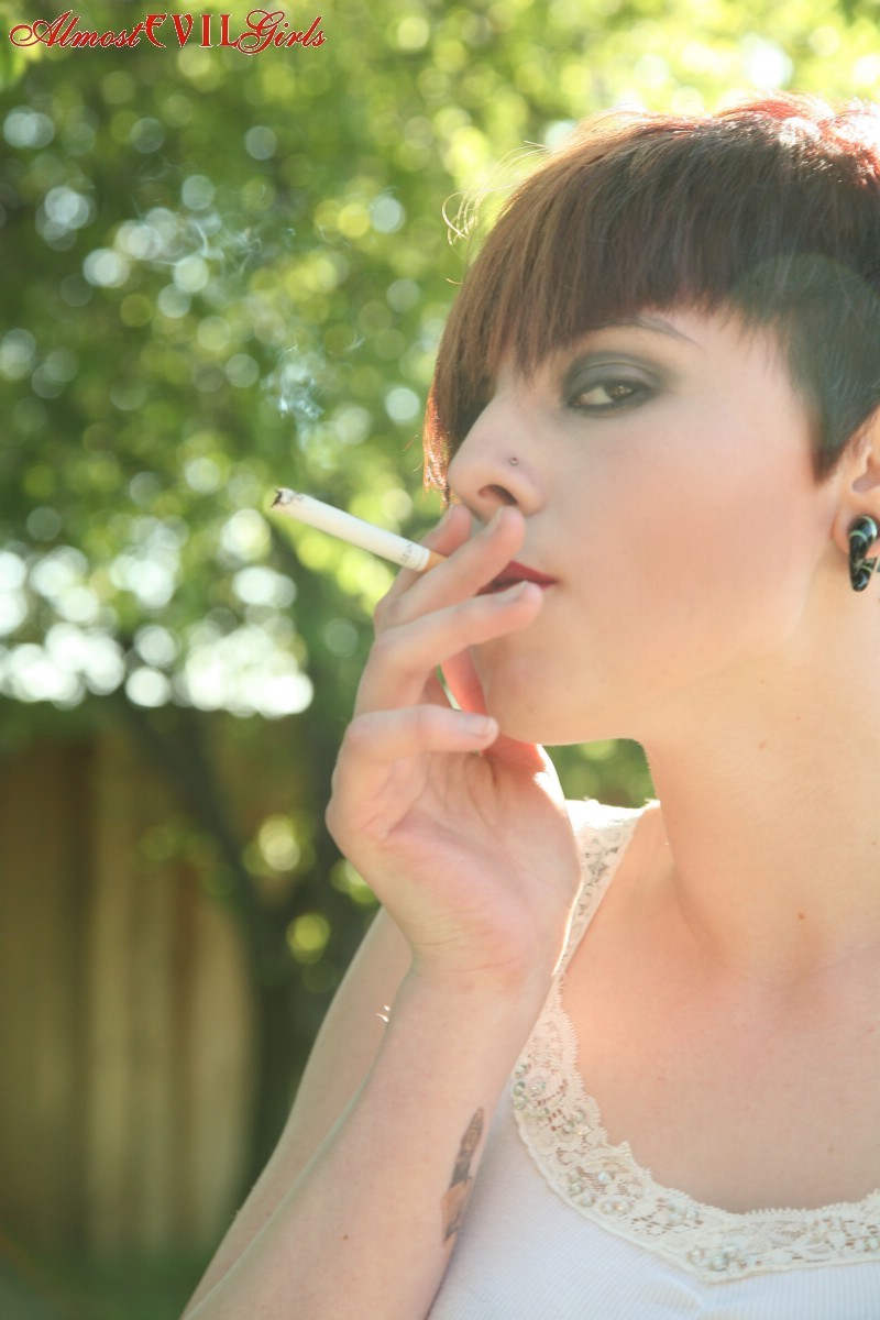 Morna smokes it up outside while she strips #76403778