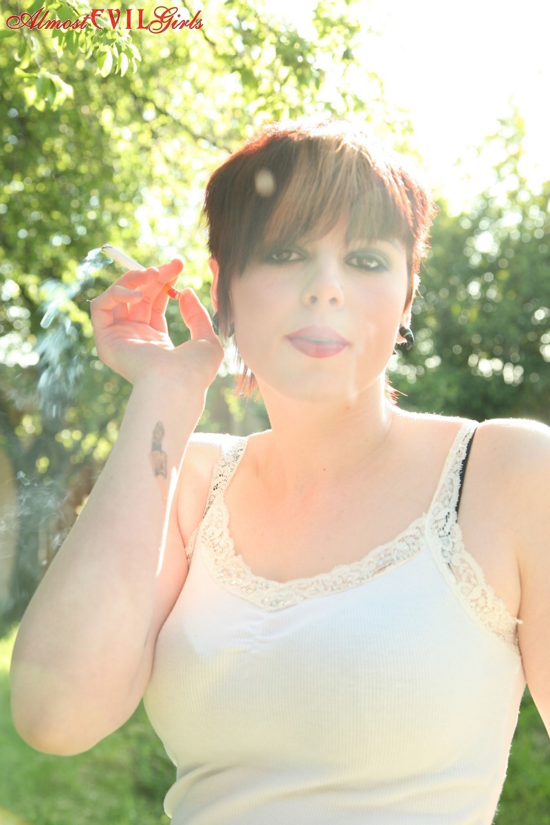 Morna smokes it up outside while she strips #76403783