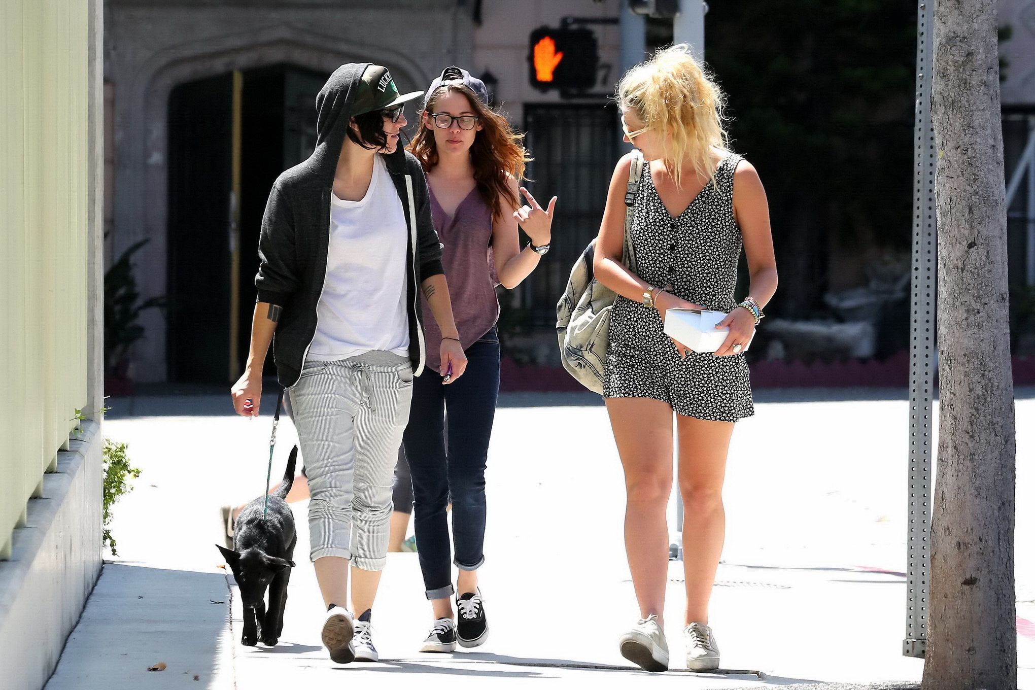 Kristen Stewart flashing her black bra in a pink see-thru top and tight jeans ou #75223235