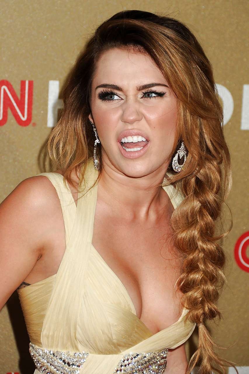 Miley Cyrus showing huge cleavage in long silk dress paparazzi pictures #75278945