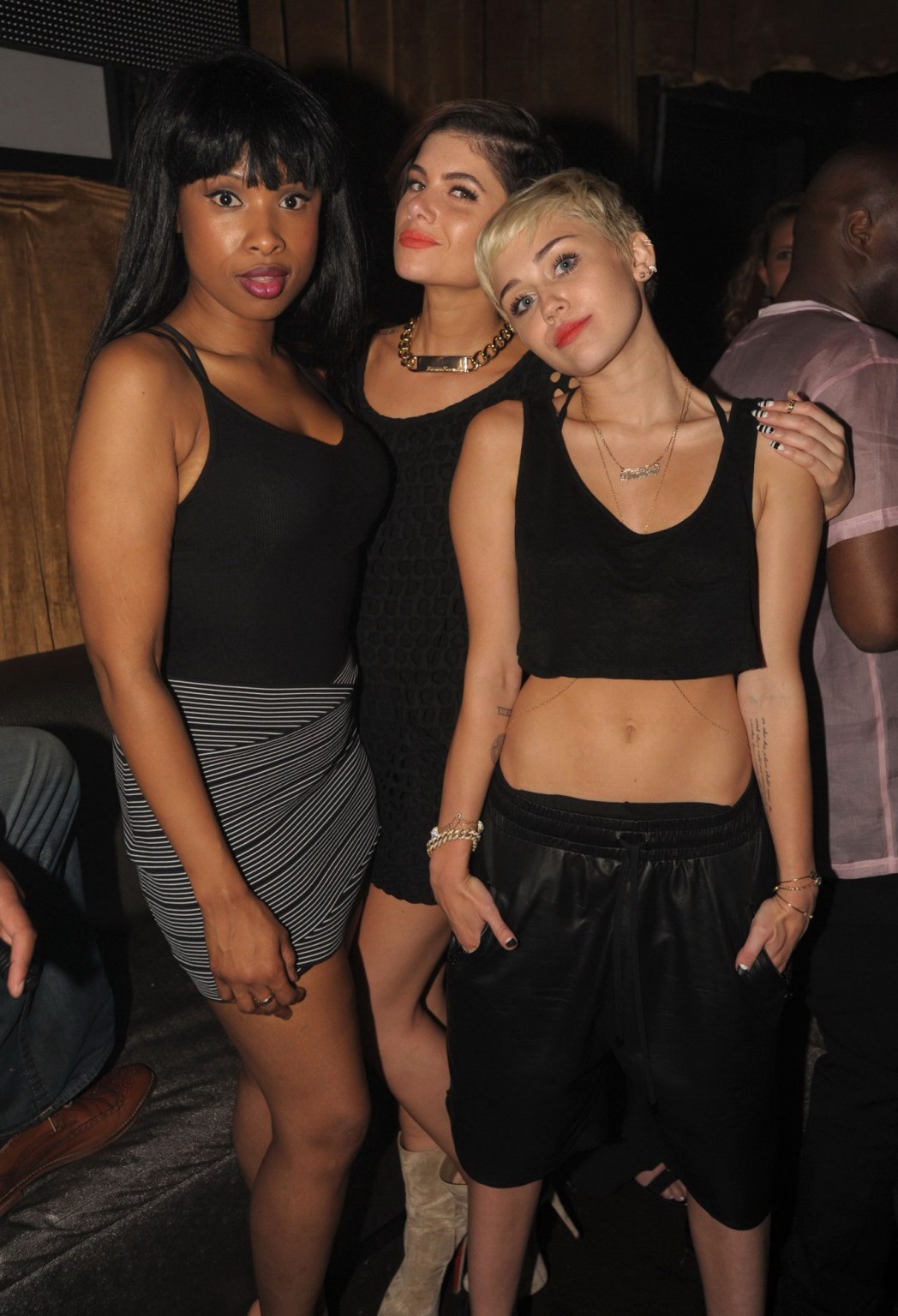 Miley Cyrus wears black belly top and leather shorts at Pharrell Williams's birt #75236149