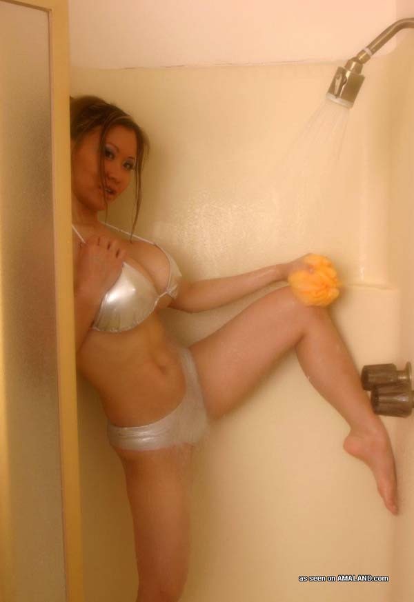 Asian darling with large melons is wet #69852331