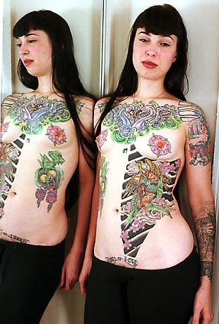 Extreme tattoo and piercing #73228971