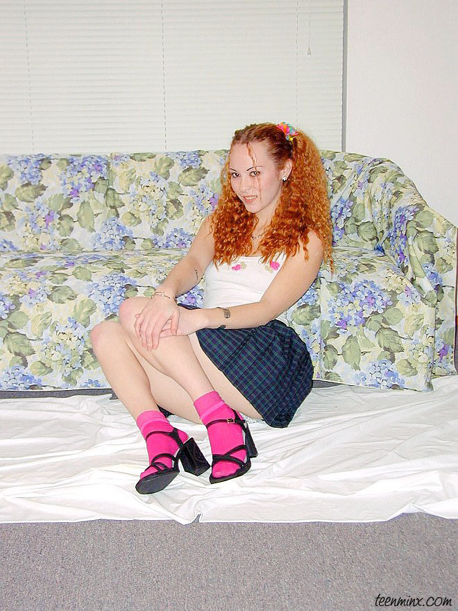 Pigtailed redhead in a skirt spreads her tight pussy and ass #70476646