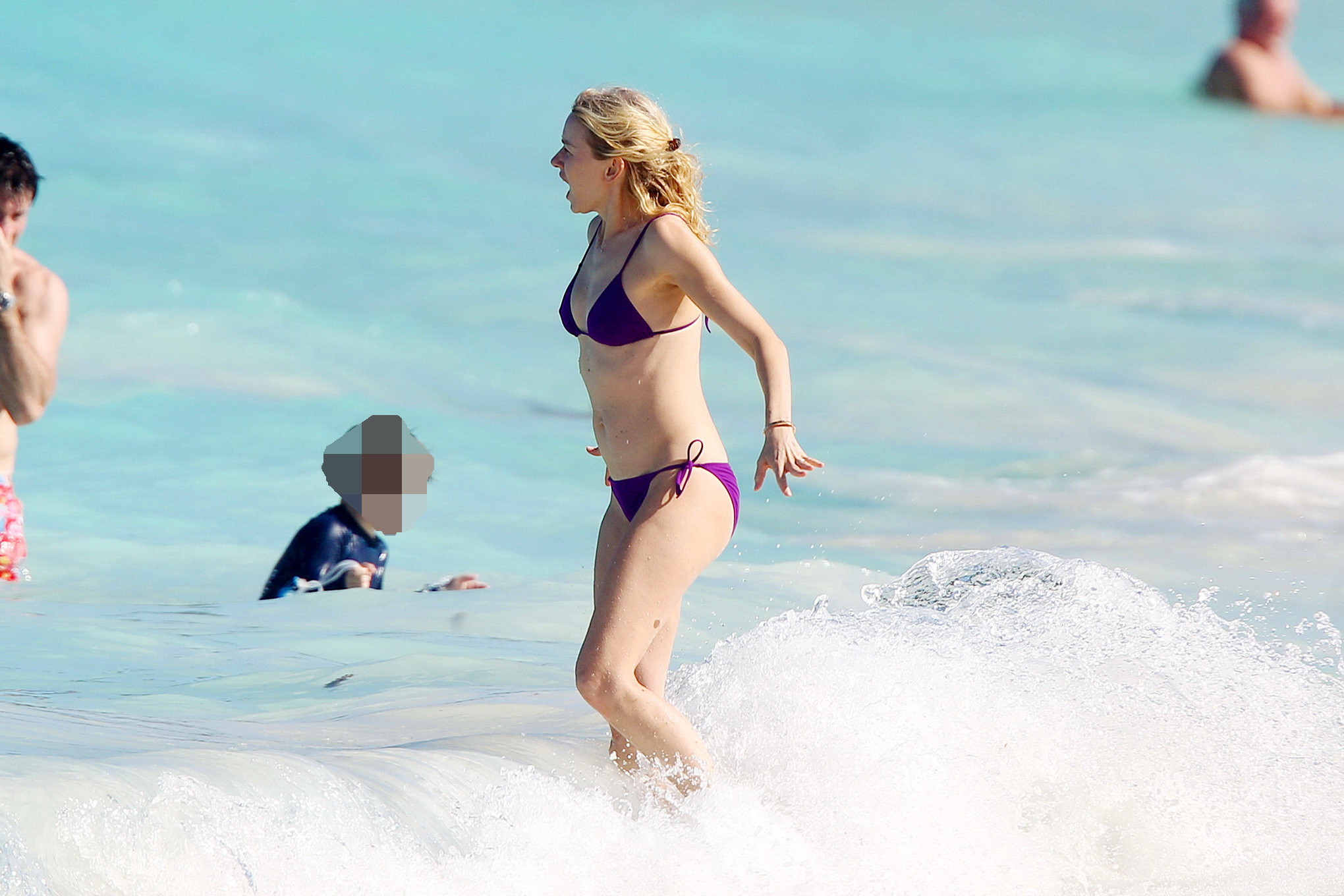 Naomi Watts shows pokies wearing a purple bikini on a beach in St. Barts #75244786