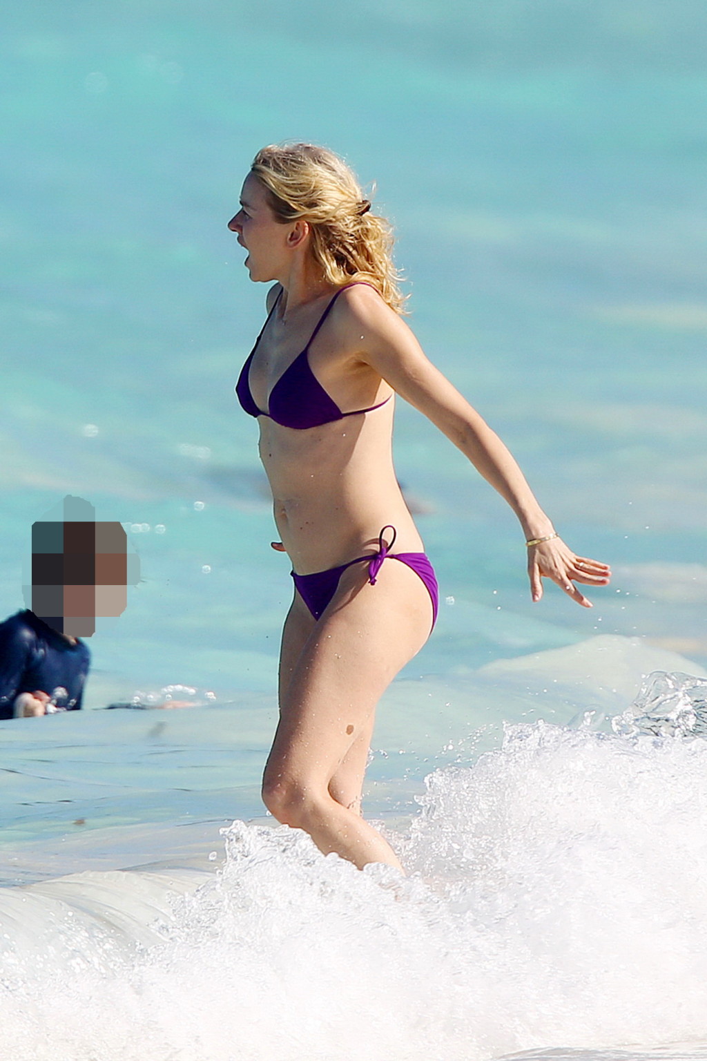 Naomi Watts shows pokies wearing a purple bikini on a beach in St. Barts #75244790