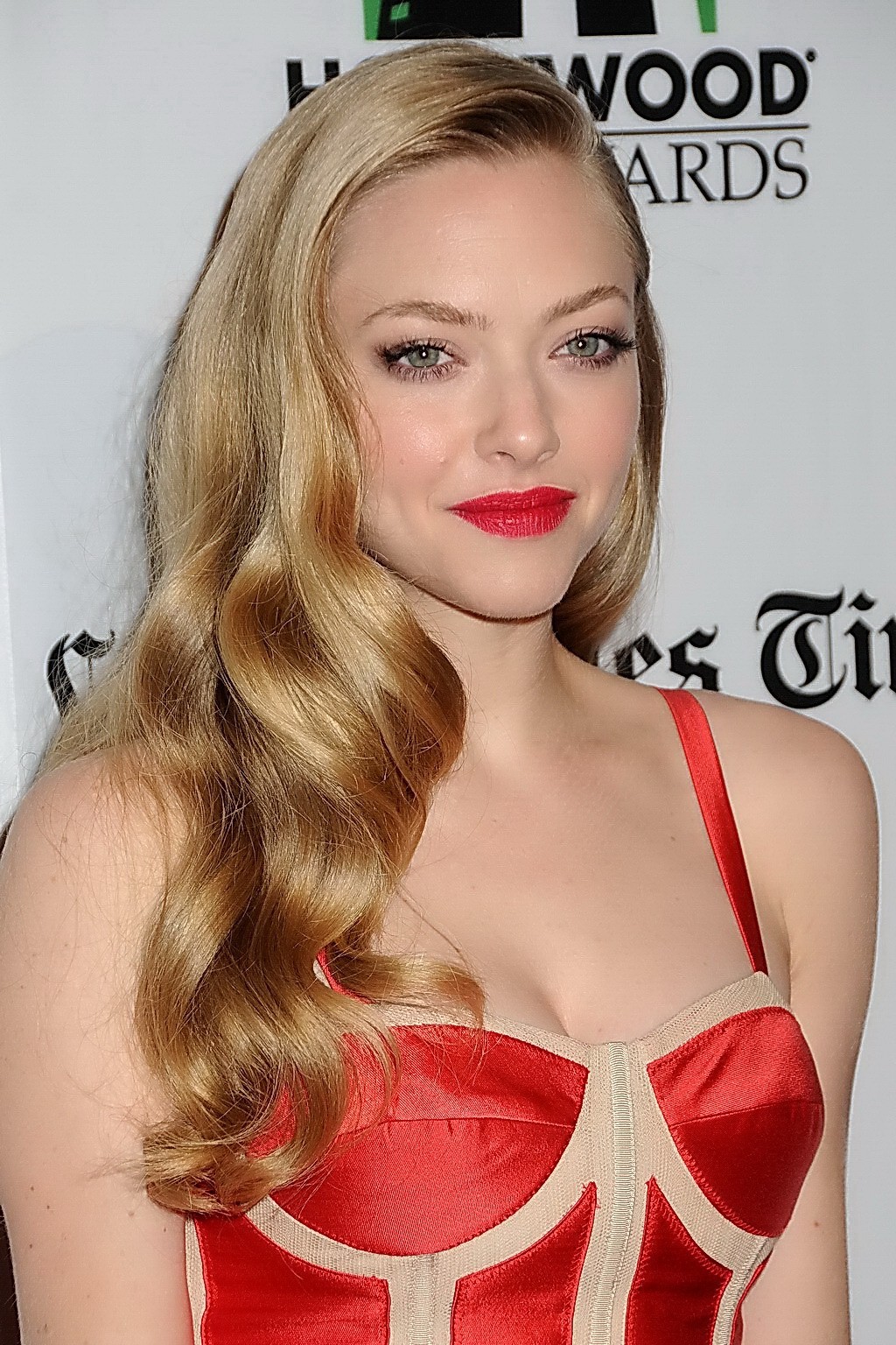 Amanda Seyfried showing big cleavage in a short low cut red dress at 16th annual #75250038