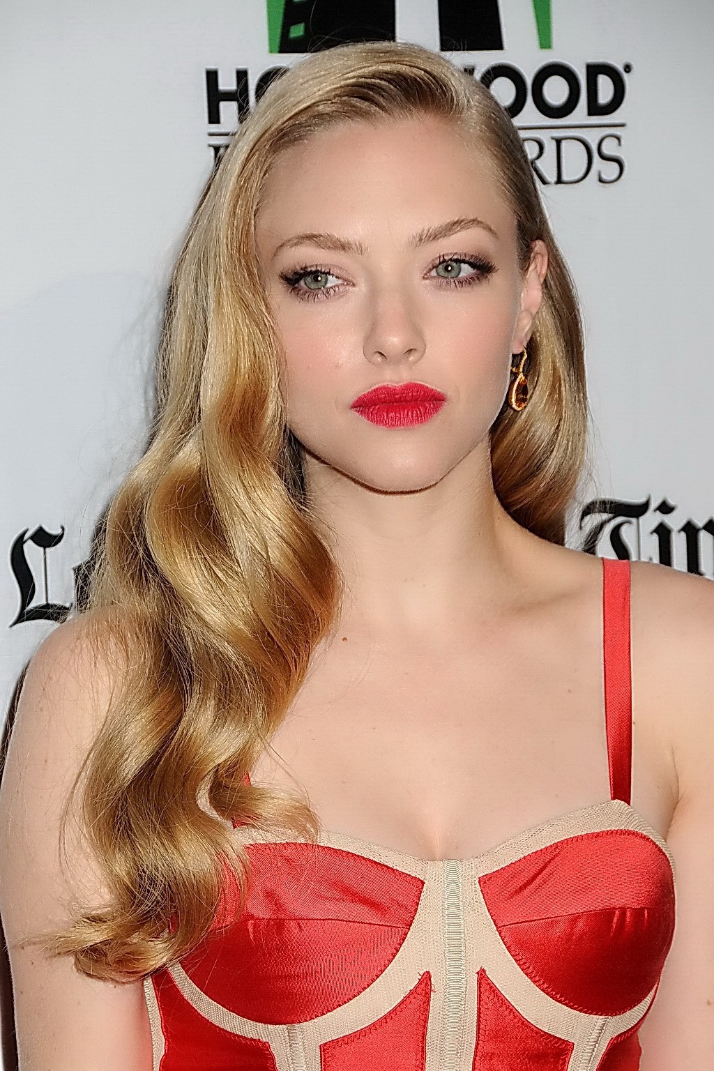 Amanda Seyfried showing big cleavage in a short low cut red dress at 16th annual #75250043