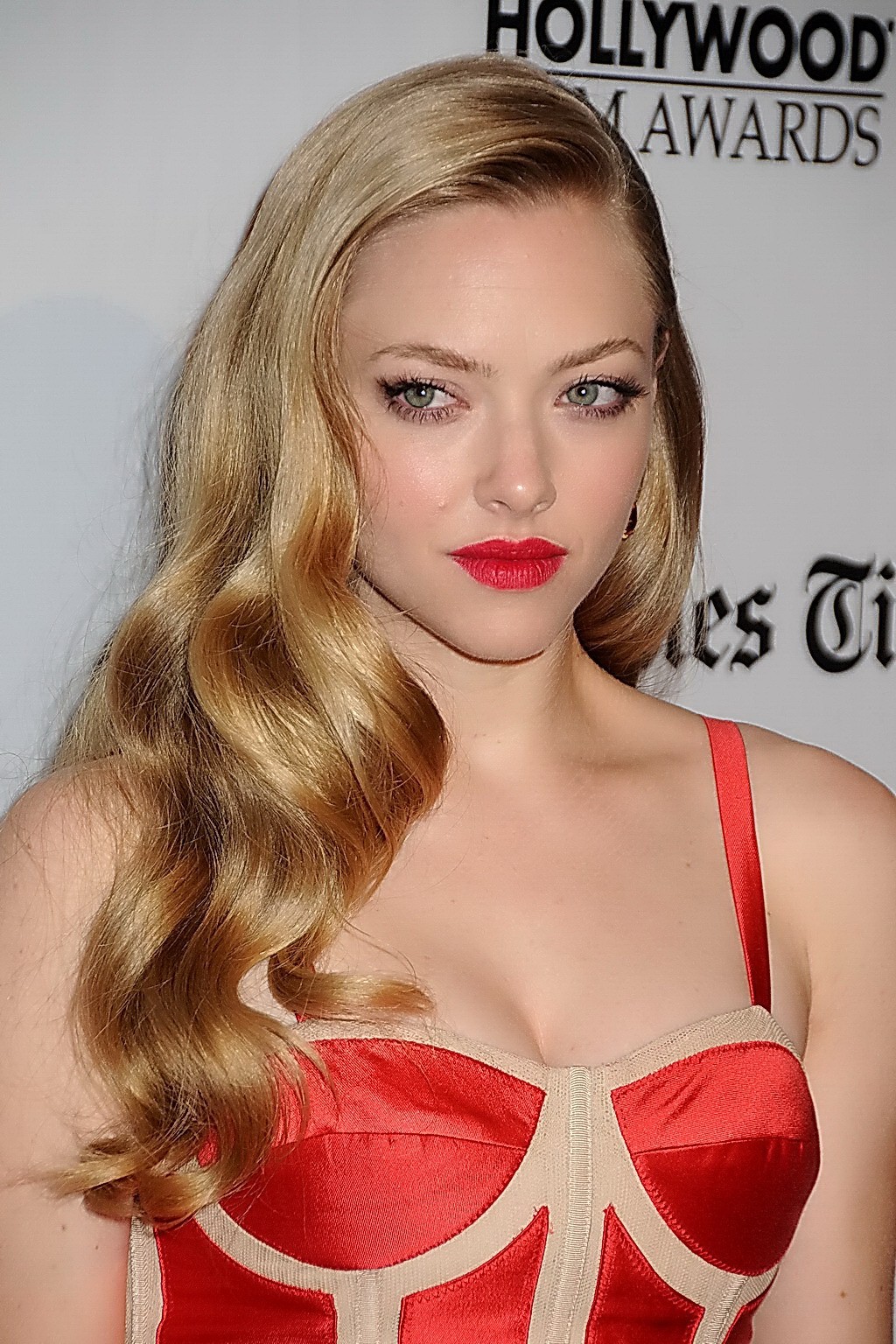 Amanda Seyfried showing big cleavage in a short low cut red dress at 16th annual #75250053
