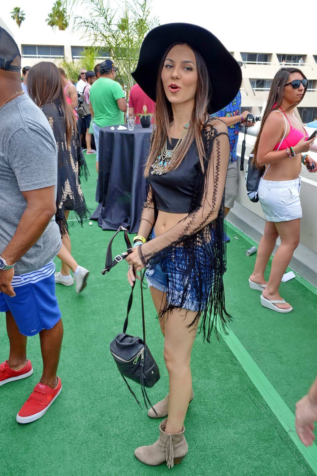 Victoria Justice wearing denim shorts and belly top at the Hard Rock Hotel Pool  #75198969